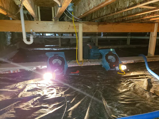 Air movers and equipment beneath a raised floor